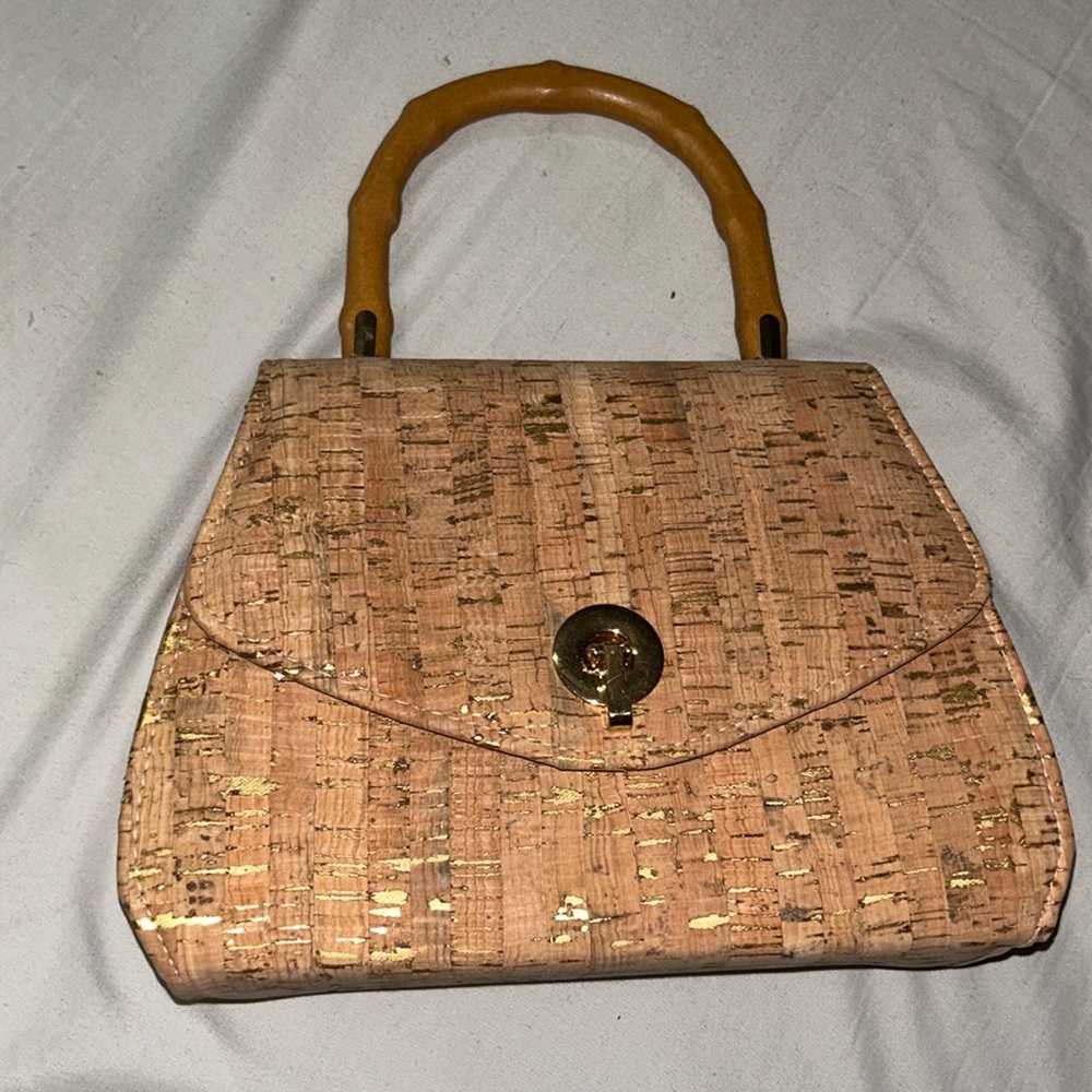 cork and gold hand bag